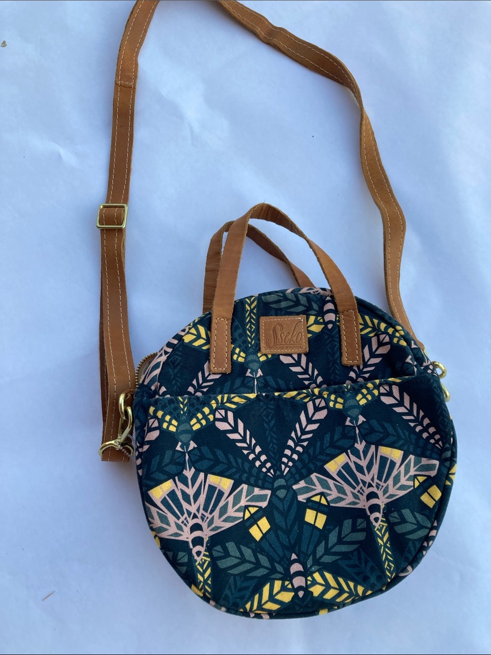 Sseko Uganda dragonfly print round crossbody tote leather canvas